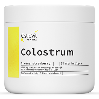 OstroVit Pharma Colostrum 100 g o smaku kremowej truskawki